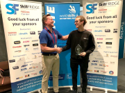 Sidney Copus, 2019 National Winner and gold medalist, being presented with his trophy.