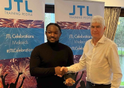 Shaun Donaldson is congratulated on receiving his award by Paul Millington, leader of the J S Wright Apprentice Academy. The presentation took place before the COVID-19 lockdown was announced