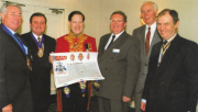 William Hunt, Windsor Herald presents the IoP’s grant of arms in 2000. Left to right: Bob Price (APHC president), Peter Wilson (IoP president), William Hunt (Windsor Herald), Andy Watts (IoP), Geoff Marsh (IoP) and John Mayfield (Master of the Worshipful Company of Plumbers)
