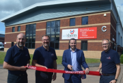 Local MP Simon Jupp cuts the ribbon at the opening of Unitherm