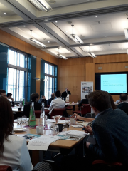 Aaron Gould, senior policy adviser at the Department for Business, Energy and Industrial Strategy (BEIS) addresses attendees at the London seminar
