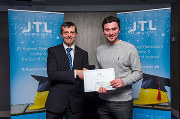 Liam Walsh (right) accepts his award from Martin Hick, head of regional delivery for JTL.