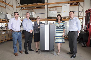 Left to right: Guy Cashmore, Kensa technical director; Matt Trewhella, contracting director; Sarah Newton MP for Truro and Falmouth; Rt. Hon. Claire Perry MP, Minister of State for Energy and Clean Growth; and James Standley, Kensa operations director.