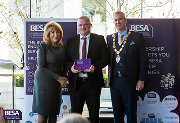 Terence McLaughlin, J S Wright associate director and leader of the J S Wright Experience programme (centre), receives the Employer Training Initiative of the Year Award for London, the South East and the Midlands from guest speaker, author and journalist Eve Pollard and BESA president Tim Hopkinson.