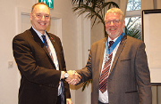 Former IOR president Stephen Gill (left) hands over the baton to Kevin Glass.
