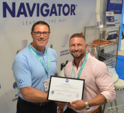 Luke Yates presents NSF certificate to John Byrne from Navigator