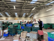 Left to right Neil from Bedford Foodbank, Olivia Withers, Hannah Salton, Tom Smith and MD Andrew Smith all from Navigator